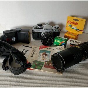 Canon AE-1 SLR Camera 50mm Lense Vivitar Flash Zoom Lense Manual Film Not Tested